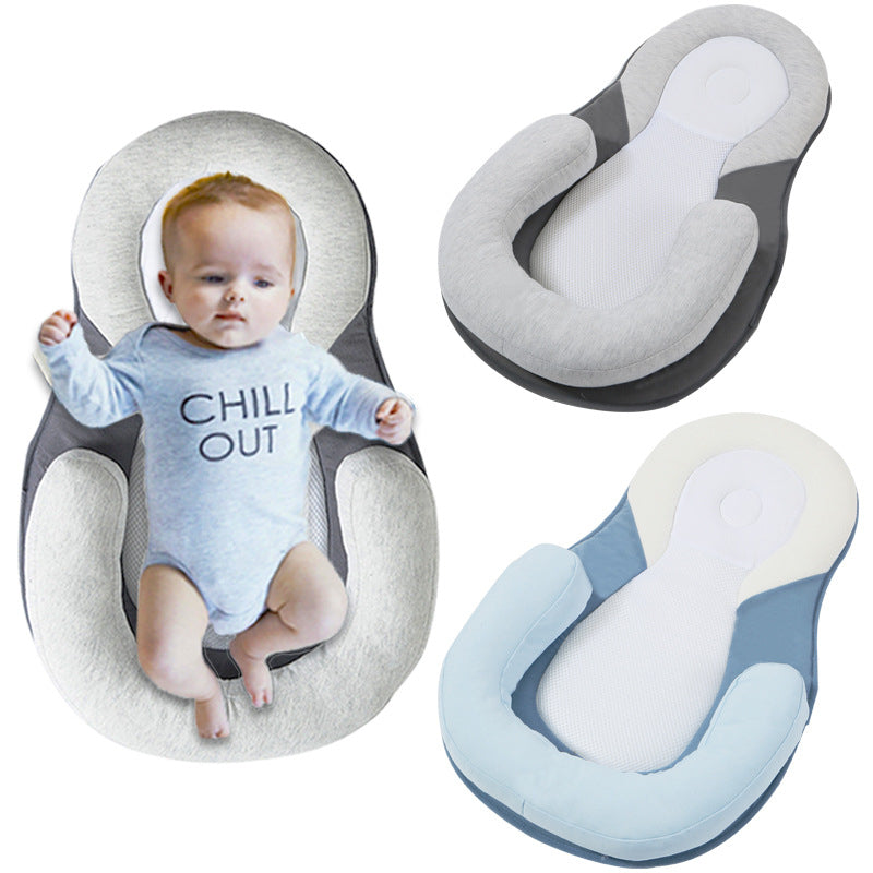 Almohada antivuelco para bebé