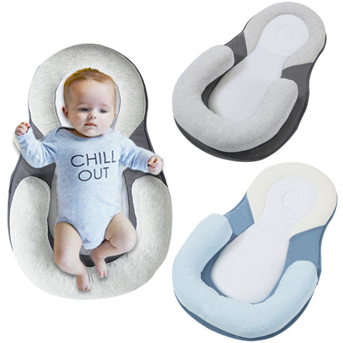 Almohada antivuelco para bebé