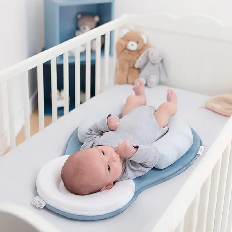Almohada antivuelco para bebé
